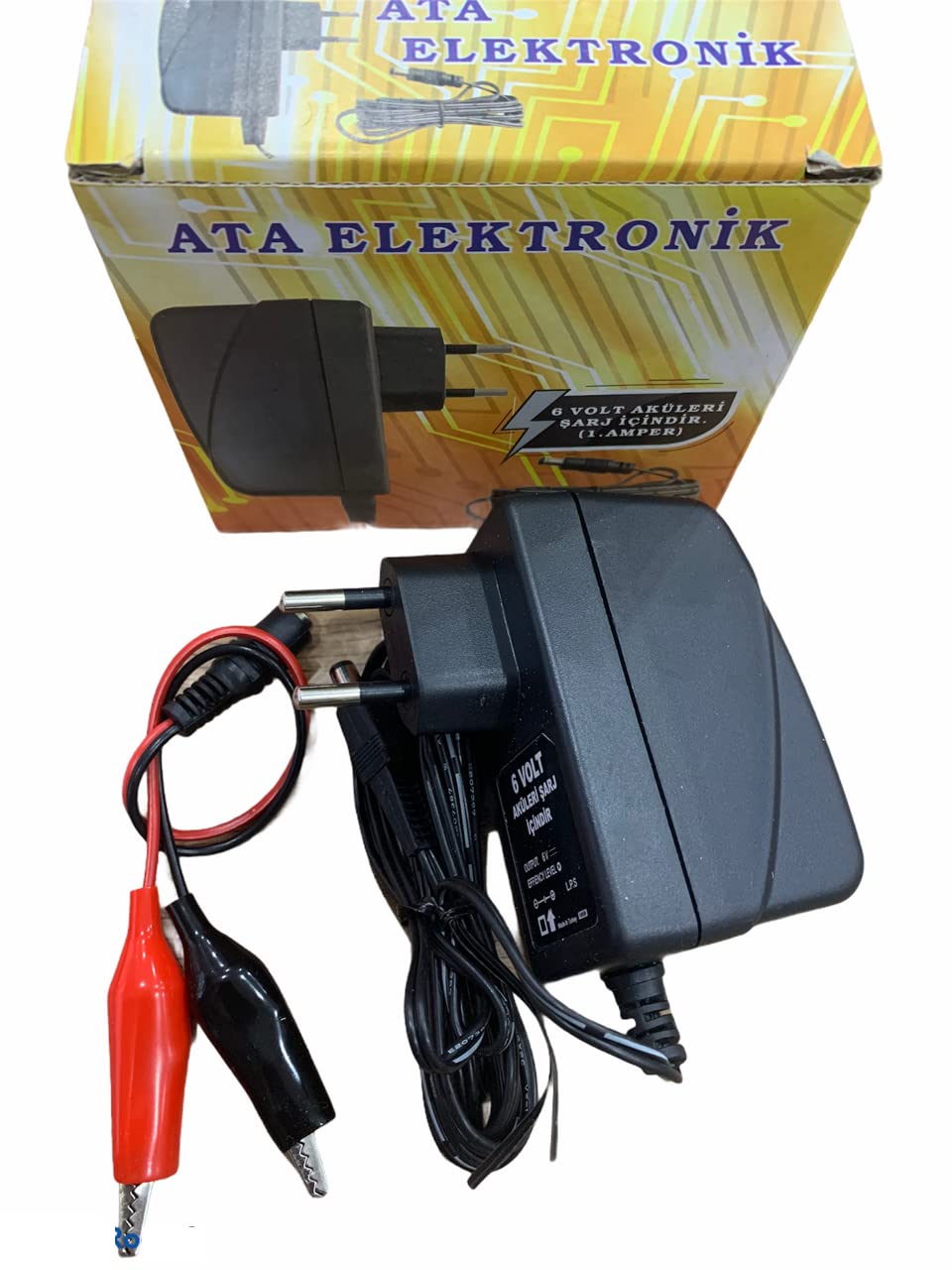 ATA ELEKTRONİK 6 Volt Kuru Tip Akü Şarj Adaptörü 6 Volt Aküler Içindir Extra Maşali Kablo Kesici Özellik ( Akü Şarj Olduğunda Voltaji Kesme Özelliği ) Akülü Araba Araç Oto Şarj Cihazi Adaptörü Garanti Yok Garanti Yok