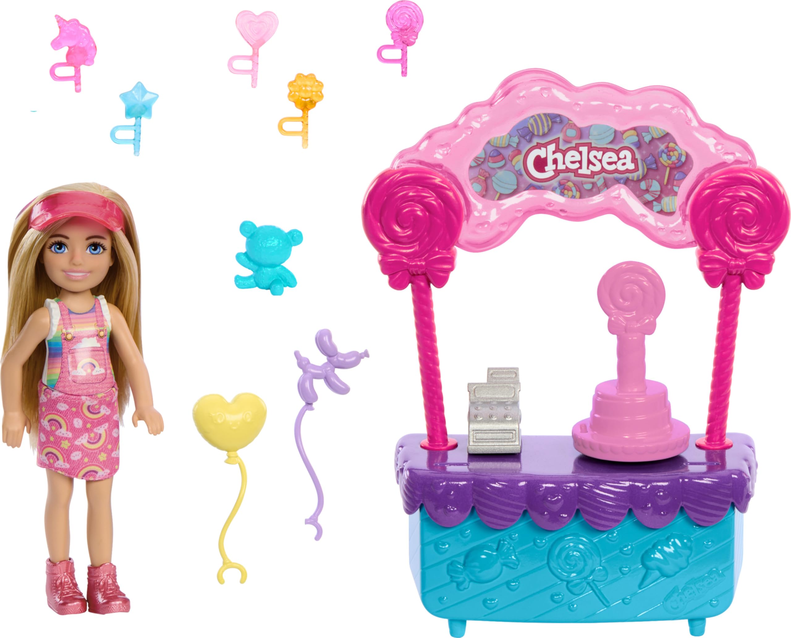 Barbie Chelsea'nin Şeker Dükkanı Oyun Seti Barbie Chelsea ve lolipop standı, aksesuarlar içeren 10 parçalık oyun seti HRM07